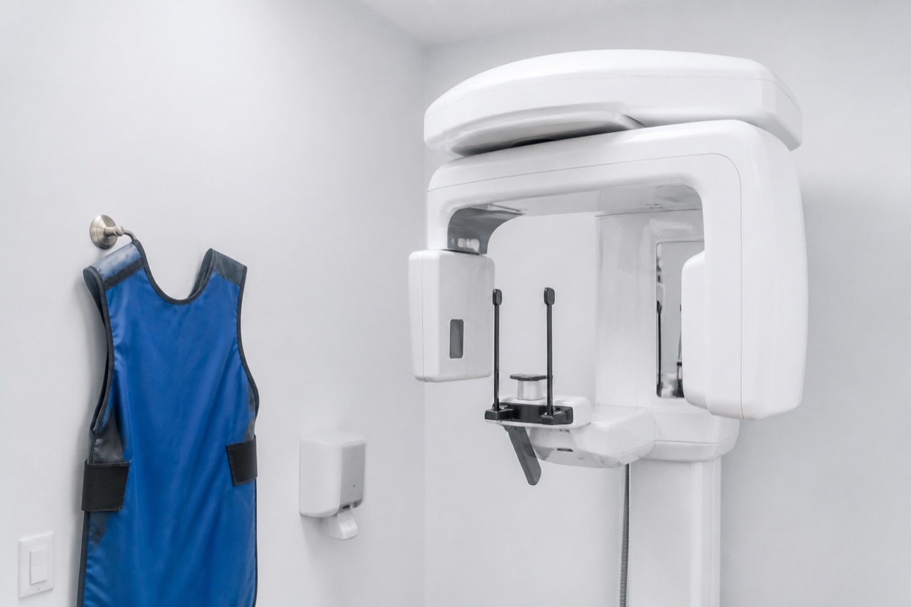 Dental panoramic imaging area with lead apron ready and clean radiography equipment